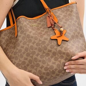 City Tote Bag In Signature Canvas With Star Charm